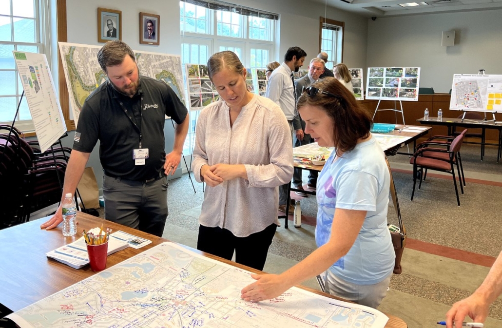 Image of participants interacting with the project team during an open house event for the Northville Nonmotorized Plan.